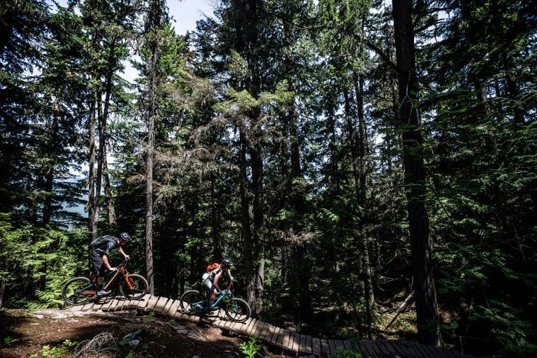 Beginner Mountain Biking in Whistler. Riders exploring Lost Lake Trails
